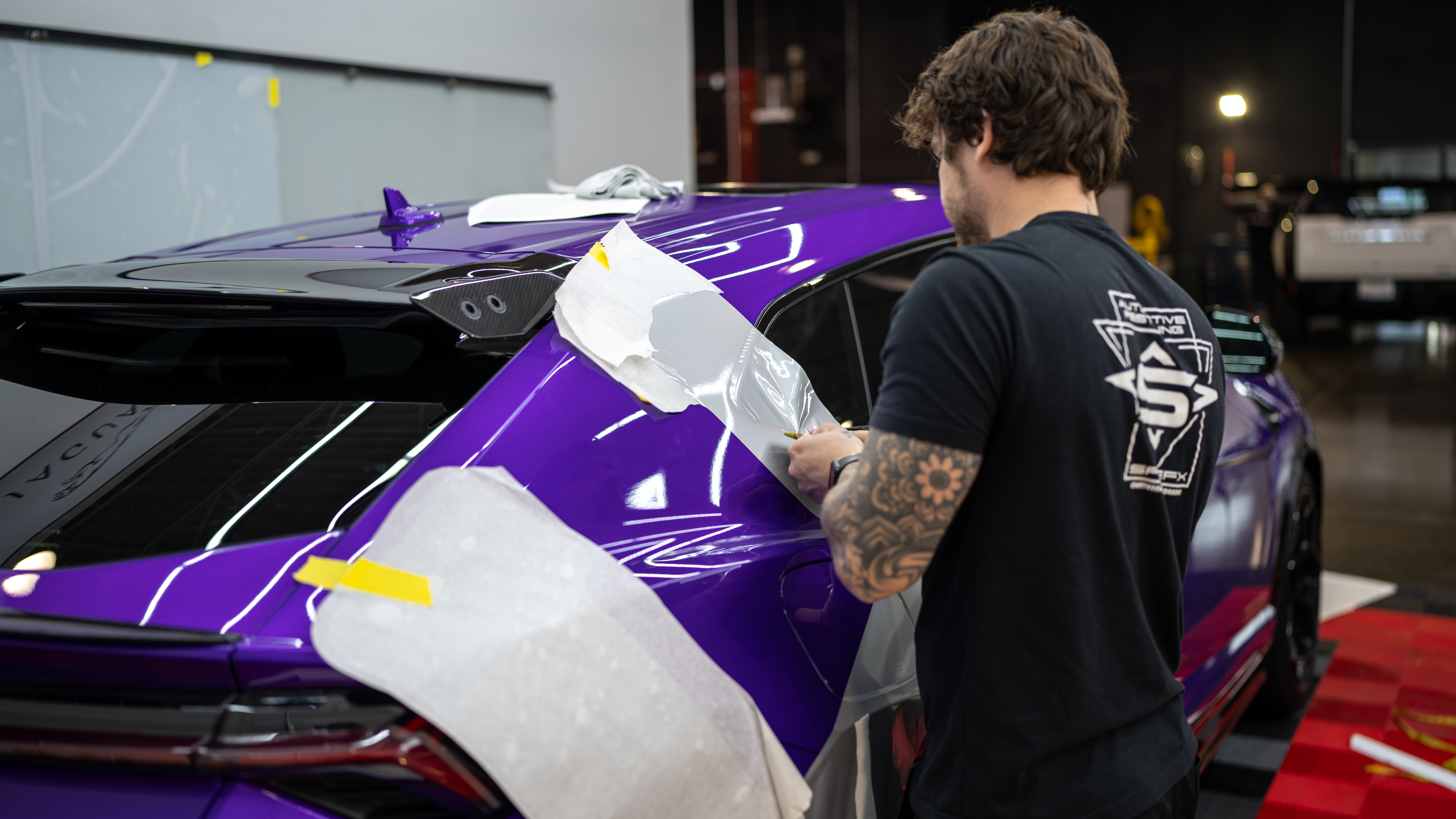 Installation of the custom decal that was applied to this Lamborghini Urus Performante