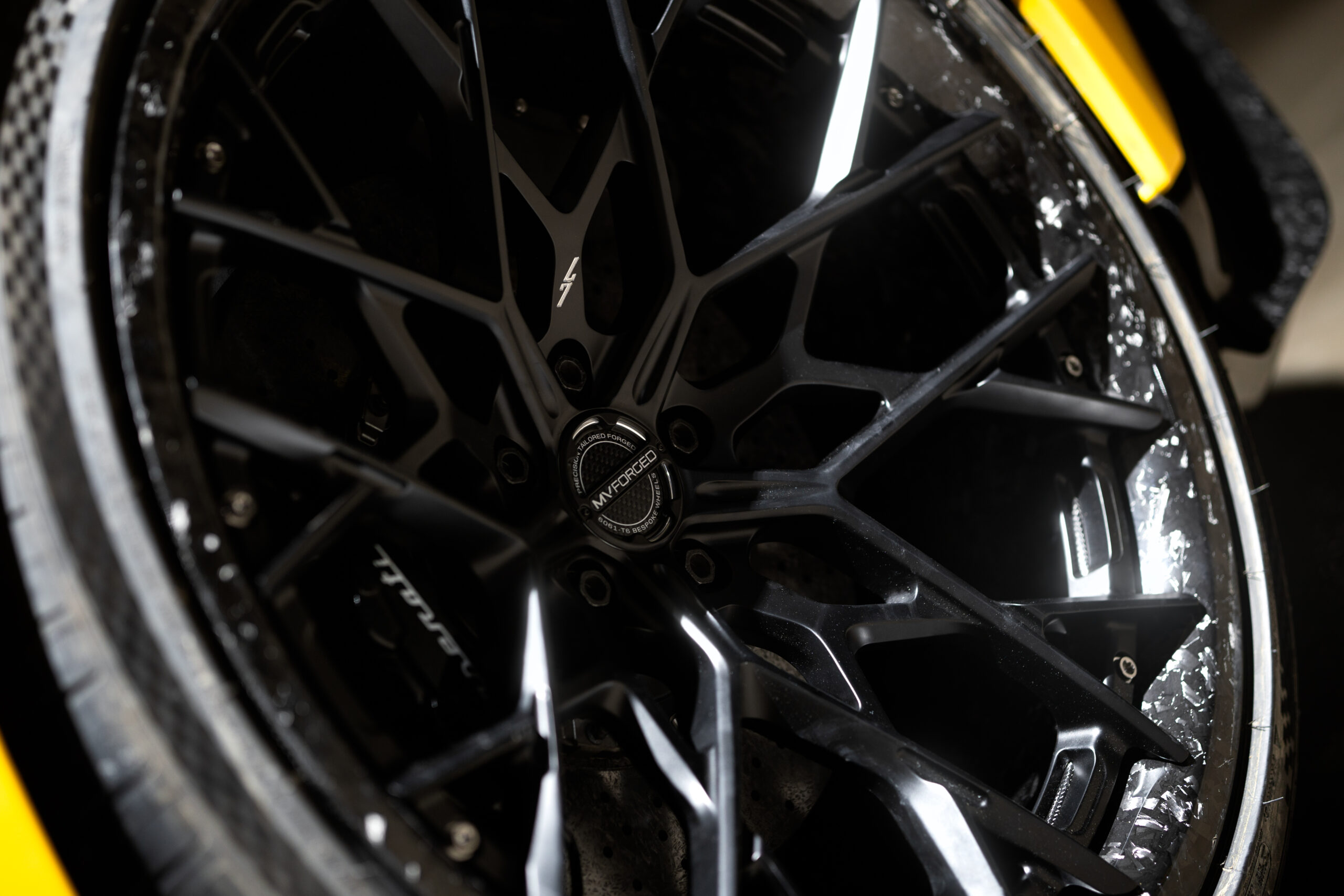 Closeup shot of the MV Forged x 7Deisgn House Forged Carbon Fiber Wheel