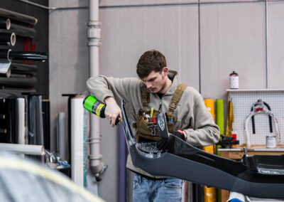 Wyatt adding the finishing touches on the new carbon fiber Ferrari 488 bumper (rear)