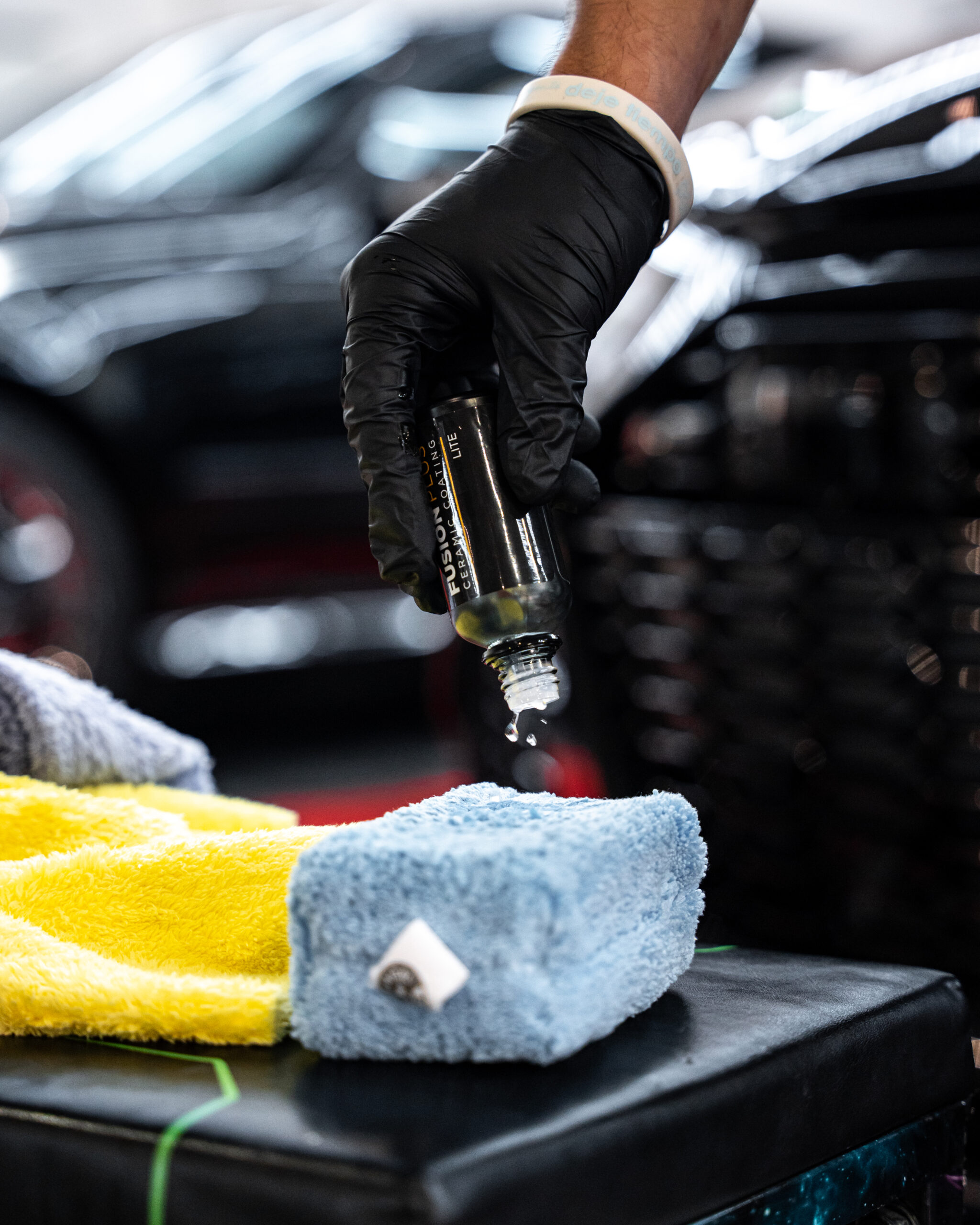 Applying Fusion Plus ceramic coating to a micro fiber towel.