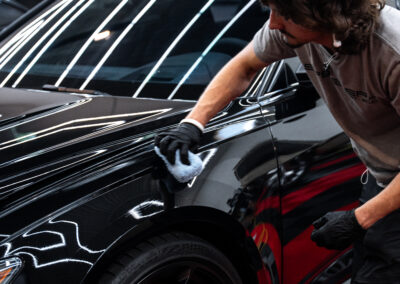 Nick Applying the Fusion Plus ceramic coating on the driver fender of the Audi RS6