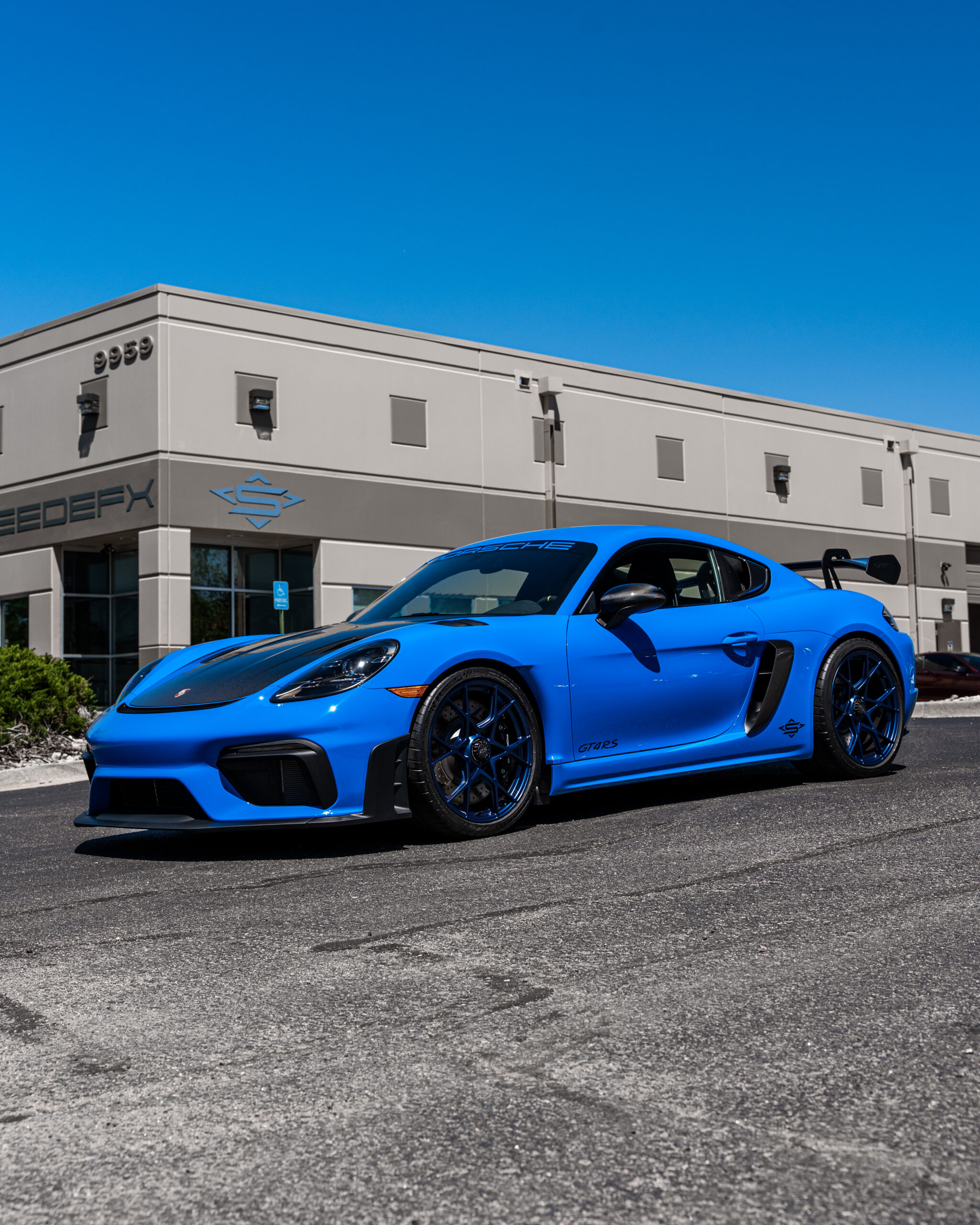 The finished Porsche GT4 RS fully protected sitting outside of Speedefx