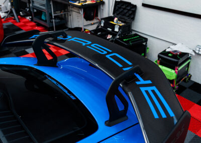 Custom "Porsche" graphics that were applied to the wing of the GT4 RS