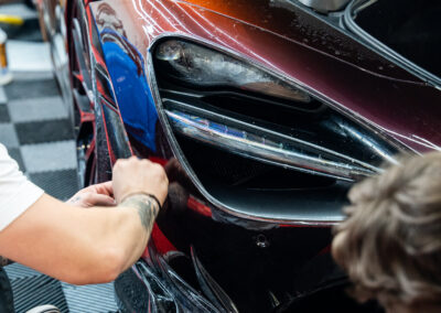 Xpel Ultimate Plus PPF being applied to the front end of this Mclaren 720s