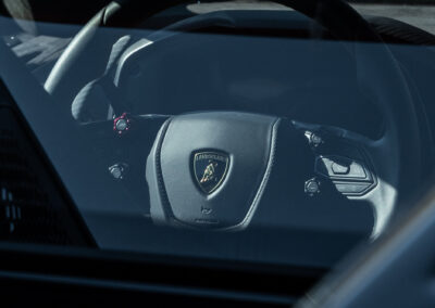 Lamborghini Revuelto steering wheel visible through the rear viewport