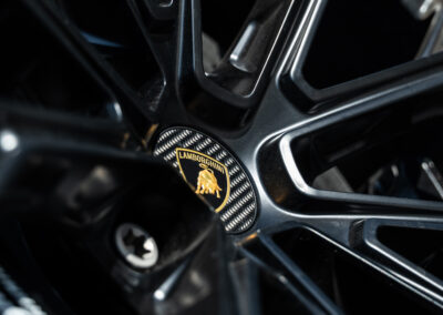 Carbon fiber center caps accentuate the Lamborghini Revuelto wheels