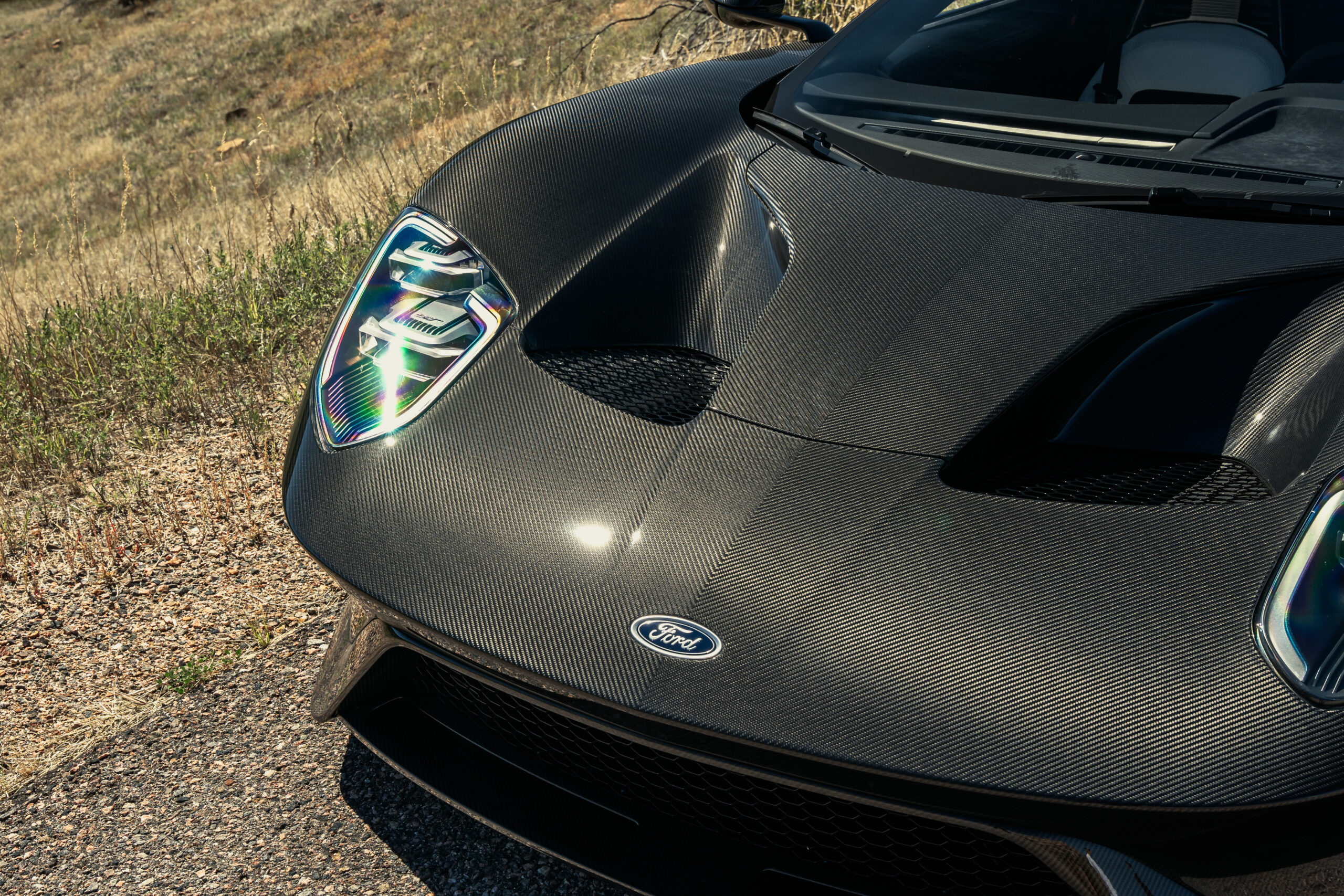 Liquid Carbon Ford GT with Brixton Forged wheels sitting in the foothills of Colorado