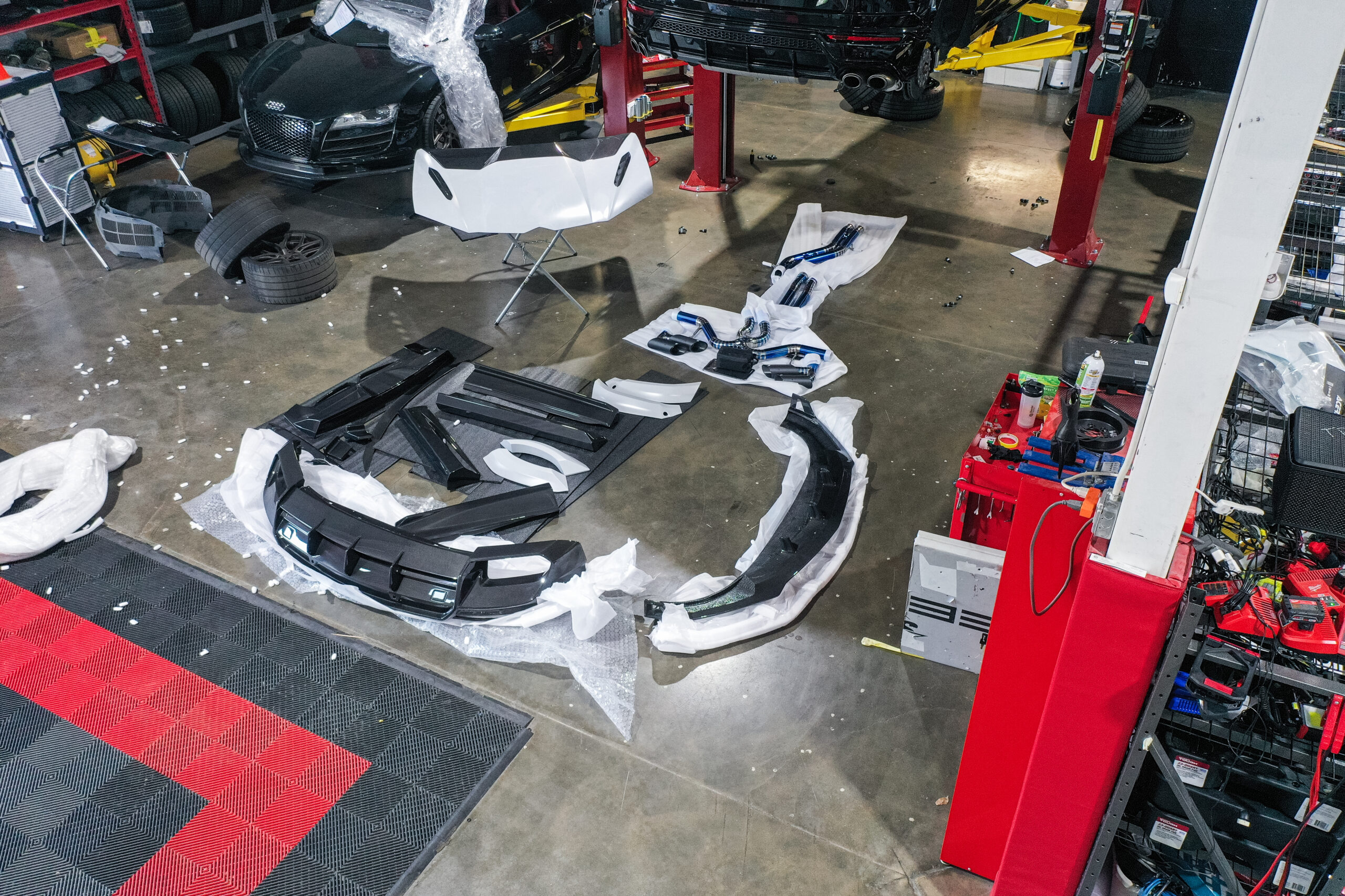 All of the Ryft Widebody panels laid out as well as the Ryft Exhaust waiting to be installed on the Lamborghini Urus